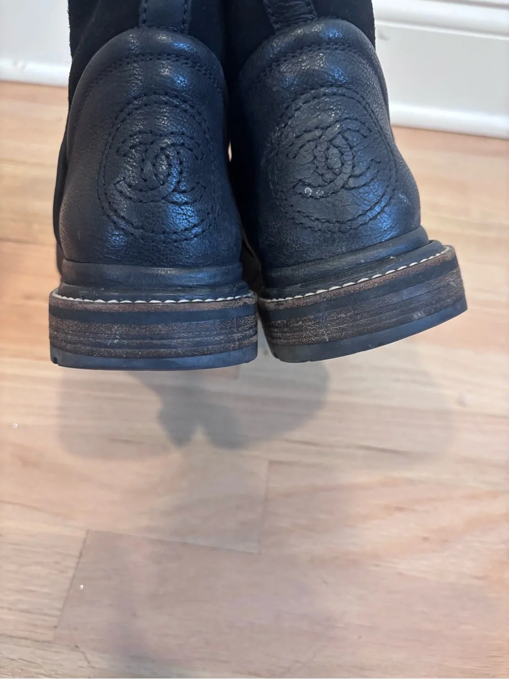 CHANEL black leather & suede boots with an embossed CC logo on heel size 37